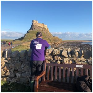 M looking at Lindisfarne